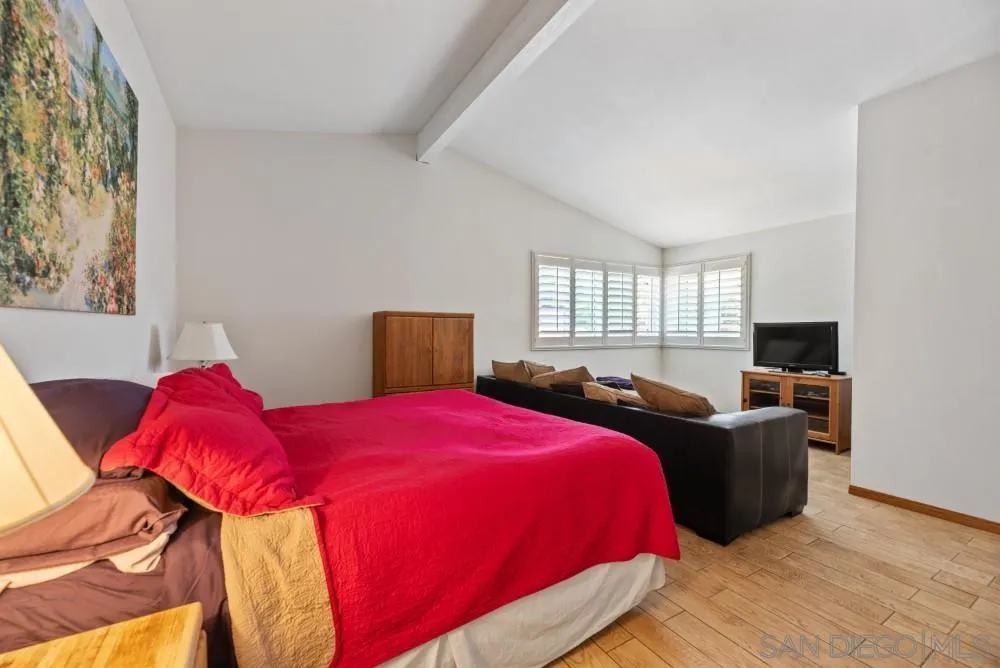 13227 Treecrest Street Poway, CA 92064 - Photo 18 of 32 a bedroom with bed and window