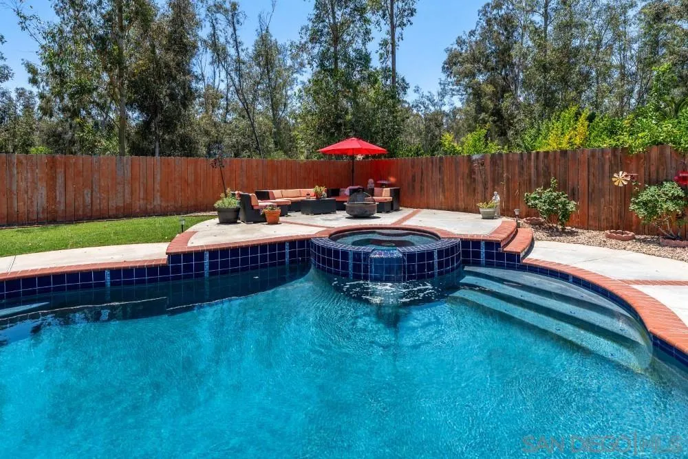 13227 Treecrest Street Poway, CA 92064 - Photo 28 of 32 a view of a house with backyard and sitting area