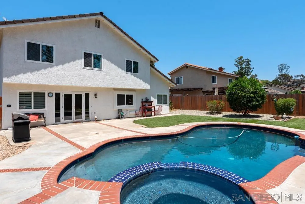 13227 Treecrest Street Poway, CA 92064 - Photo 29 of 32 a view of outdoor space yard swimming pool and patio