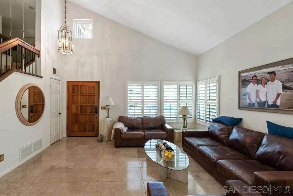 13227 Treecrest Street Poway, CA 92064 - Photo 7 of 32 a living room with furniture and a large window