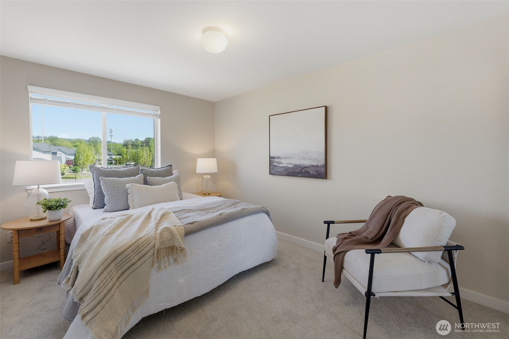 7625 148th Avenue East Sumner, WA 98390 - Photo 29 of 40 a bedroom with a bed chair and window