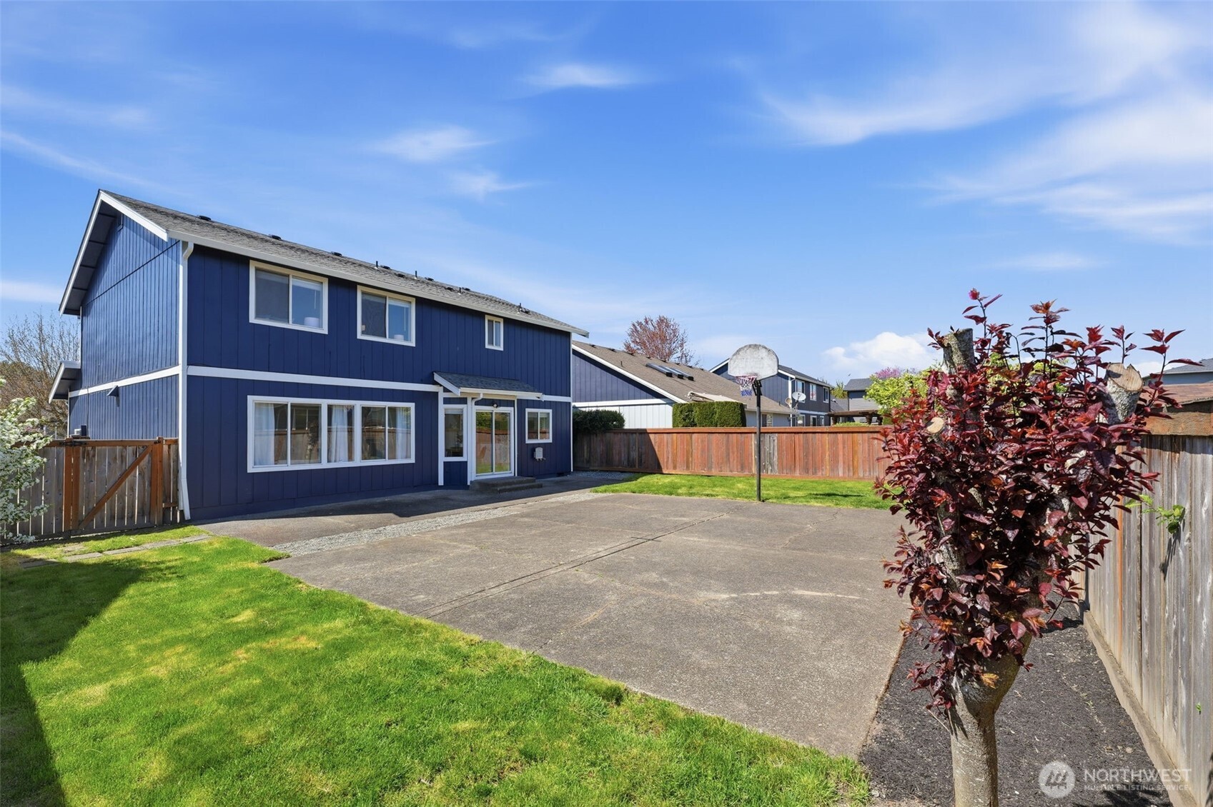 7625 148th Avenue East Sumner, WA 98390 - Photo 34 of 40 a house view with a garden space