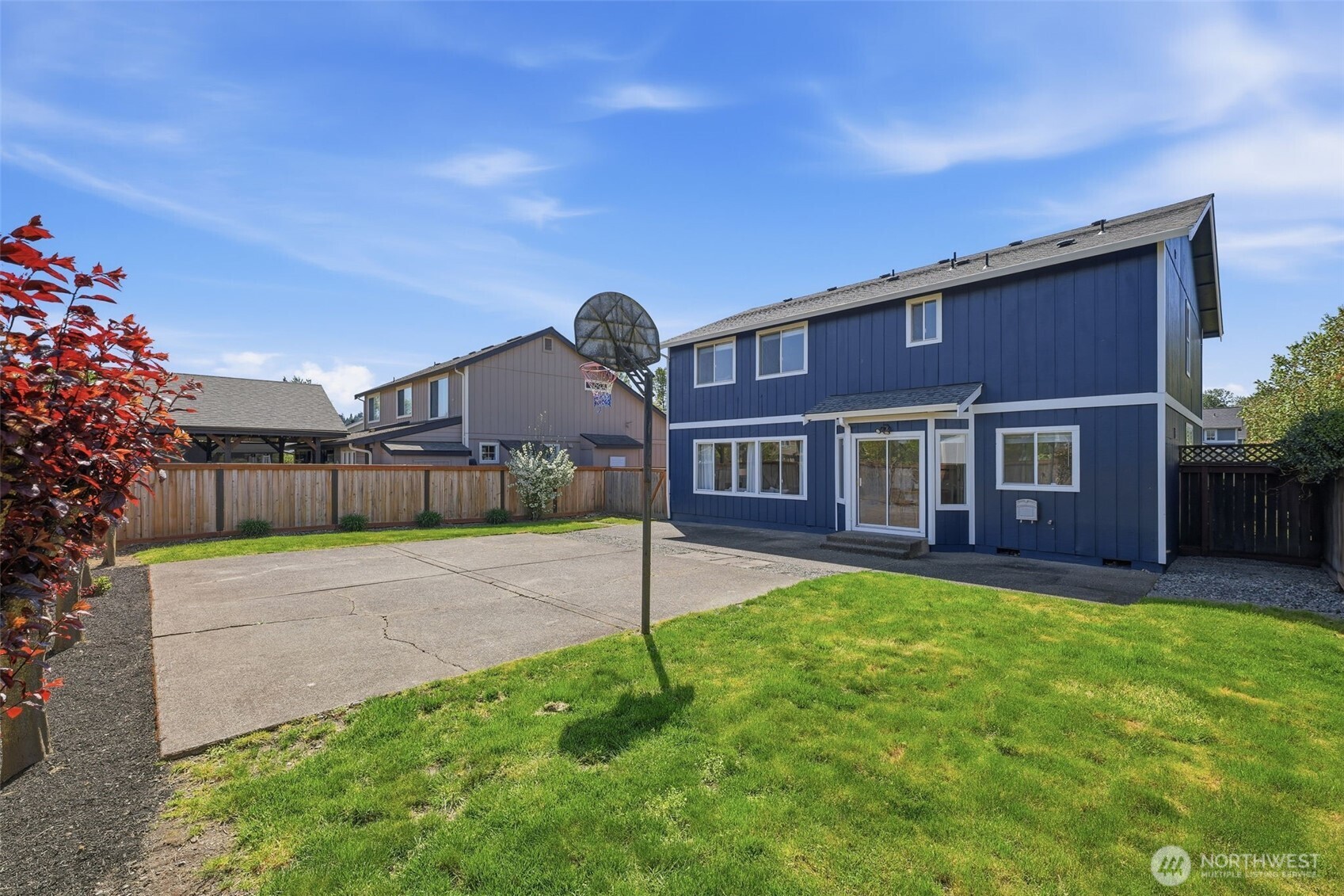 7625 148th Avenue East Sumner, WA 98390 - Photo 35 of 40 a front view of a house with a yard