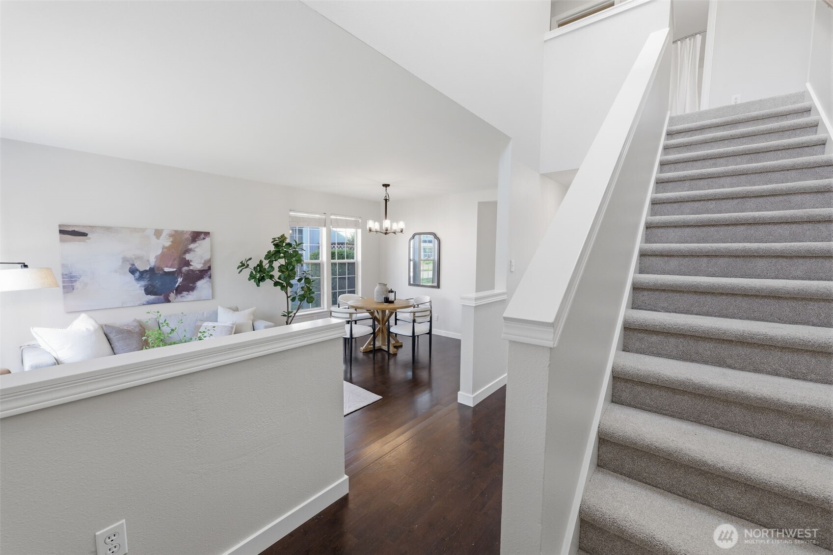 7625 148th Avenue East Sumner, WA 98390 - Photo 4 of 40 a view of hall way with furniture and wooden floor