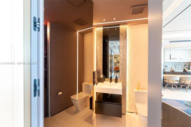 a bathroom with a mirror and a shower