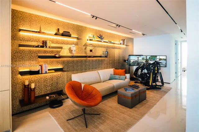 a reading room with furniture and wooden floor