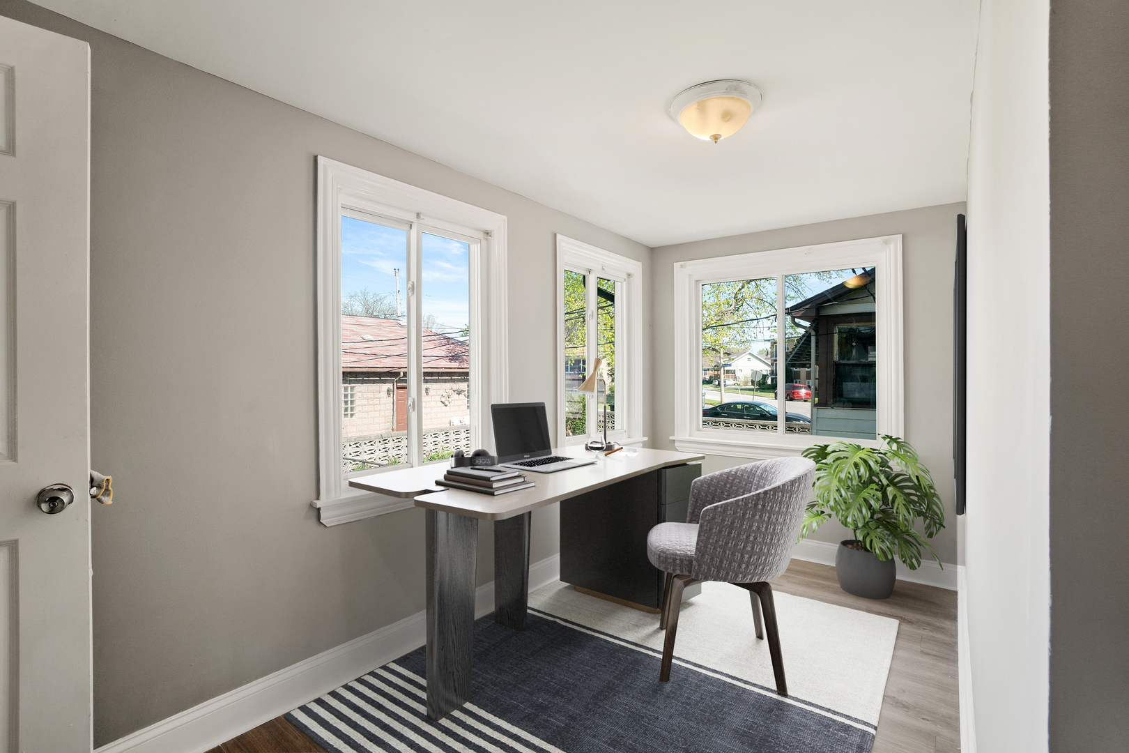 Undisclosed Address Dolton, IL 60419 - Photo 12 of 17 a view of a workspace with furniture and a window