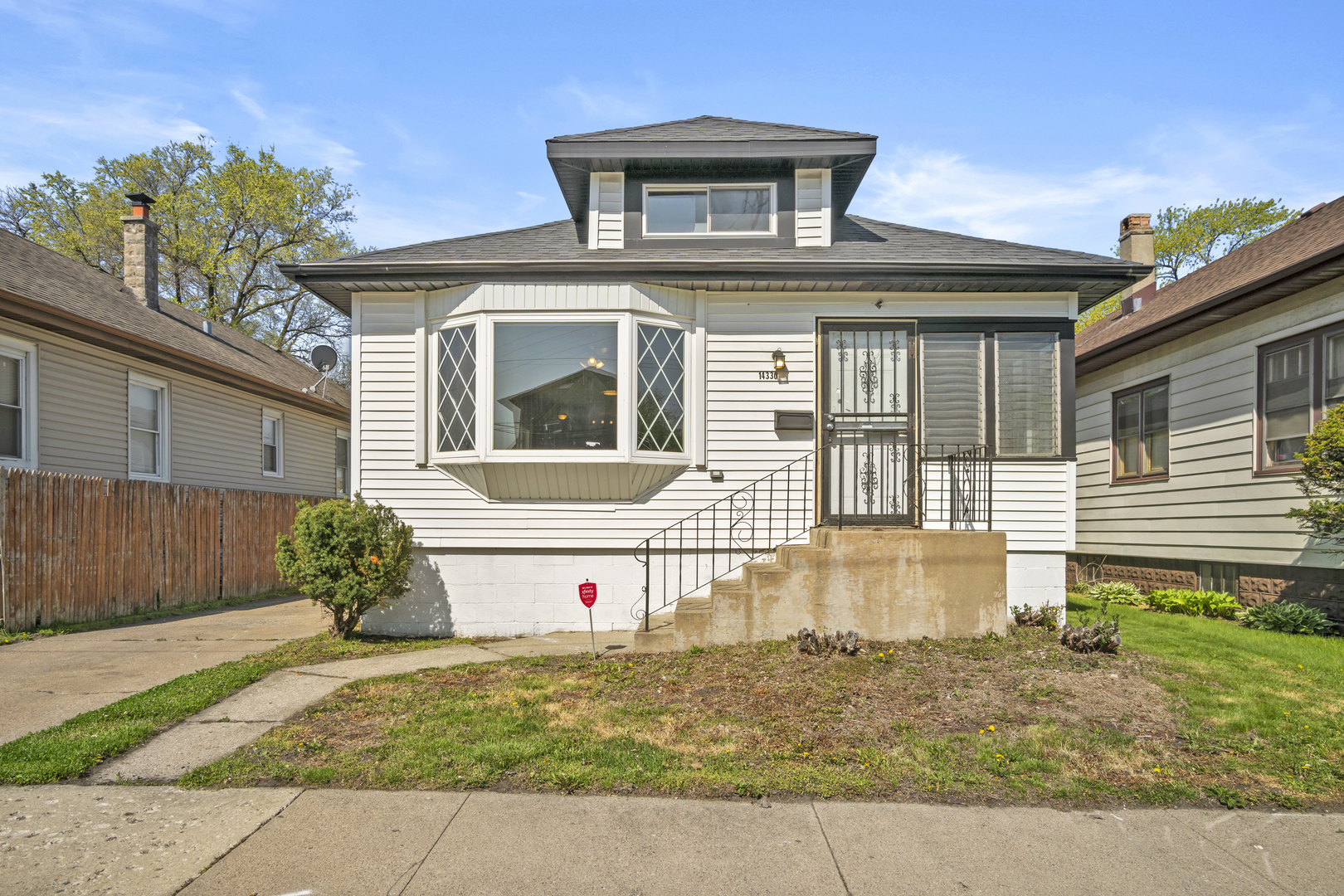 Undisclosed Address Dolton, IL 60419 - Photo 17 of 17 a front view of a house
