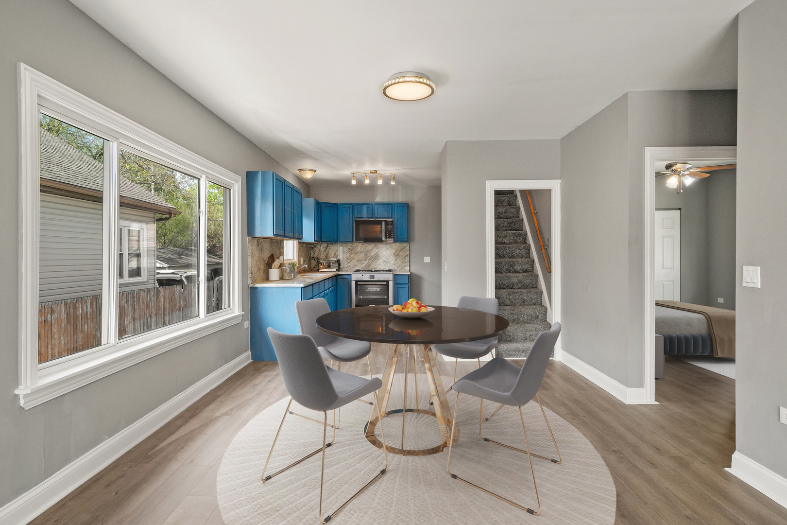 Undisclosed Address Dolton, IL 60419 - Photo 5 of 17 a dining room with furniture and wooden floor
