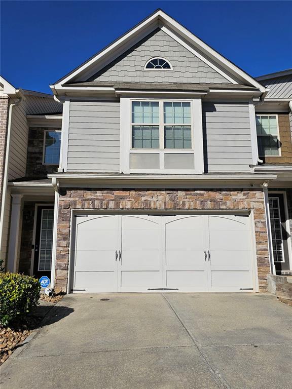 5747 Radford Loop Fairburn, GA 30213 - Photo 2 of 36 a front view of a house