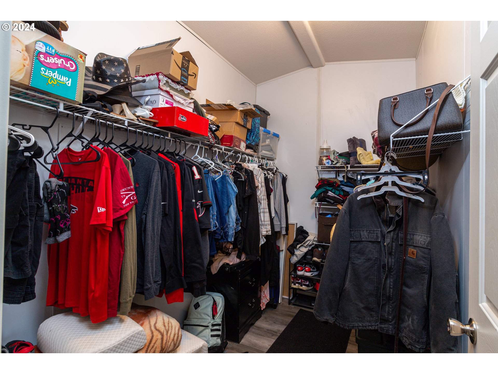 80265 Canal Road Hermiston, OR 97838 - Photo 9 of 26 a view of walk in closet with clothes and shoes