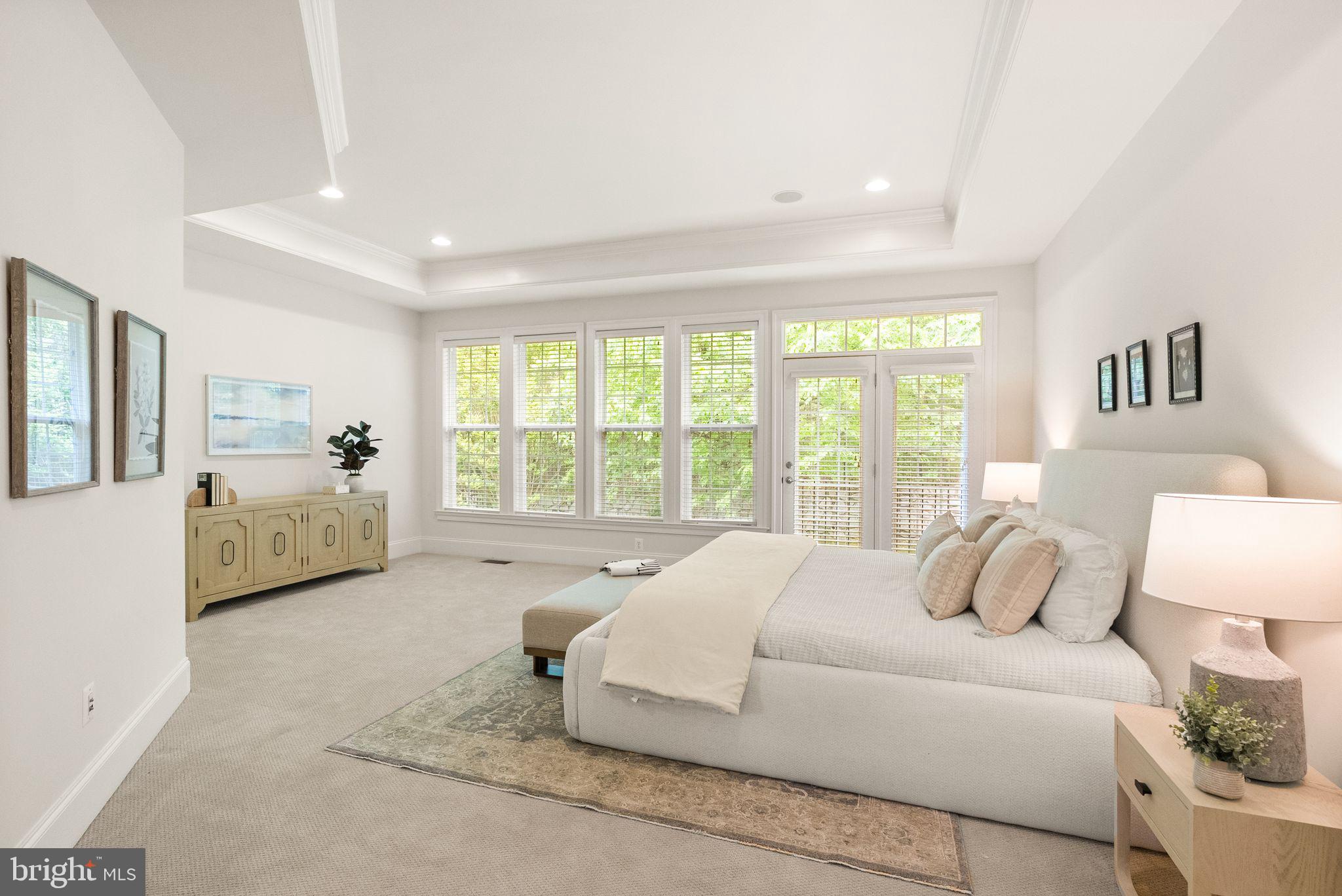 7534 Red Hill Drive Springfield, VA 22153 - Photo 25 of 90 a spacious bedroom with a bed and a large window
