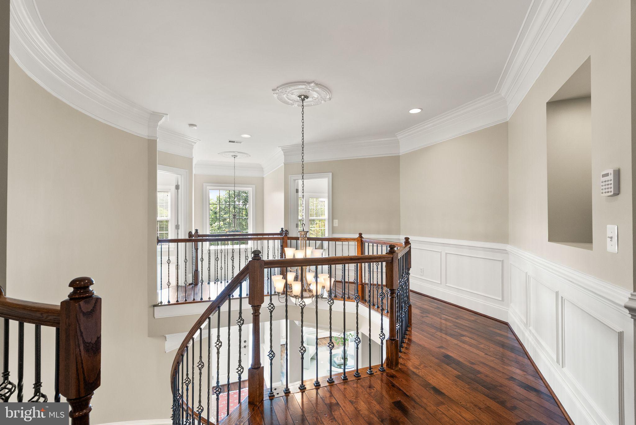 7534 Red Hill Drive Springfield, VA 22153 - Photo 38 of 90 a view of hallway with wooden floor and windows