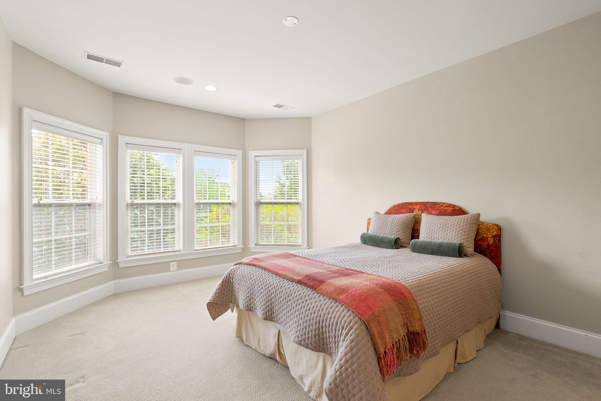 7534 Red Hill Drive Springfield, VA 22153 - Photo 48 of 90 a bedroom with a bed and a large window