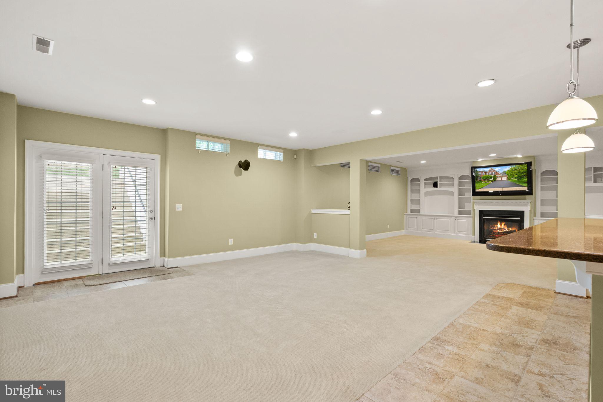 7534 Red Hill Drive Springfield, VA 22153 - Photo 61 of 90 a view of an empty room with a fireplace