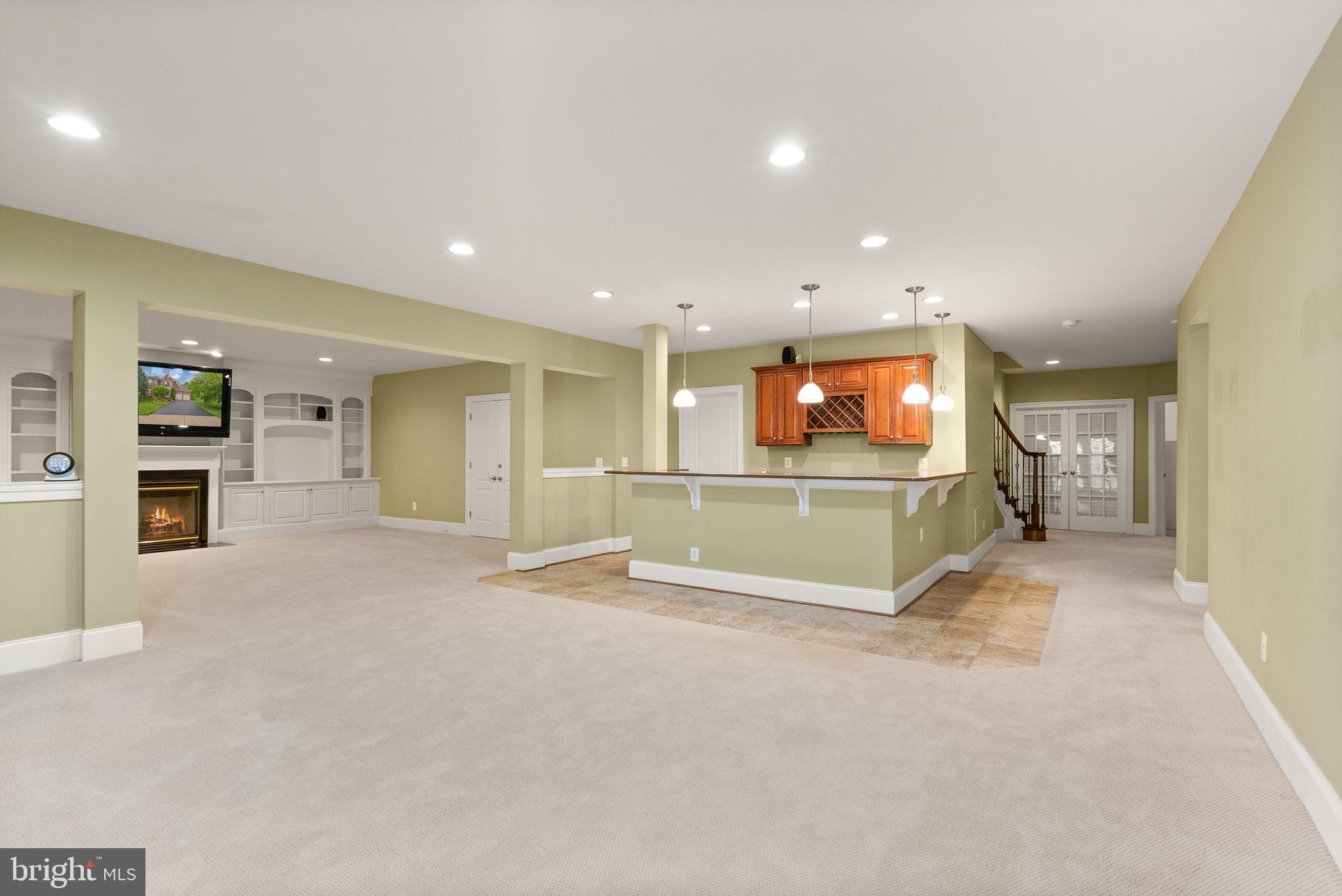 7534 Red Hill Drive Springfield, VA 22153 - Photo 65 of 90 a view of an empty room with a window and kitchen view