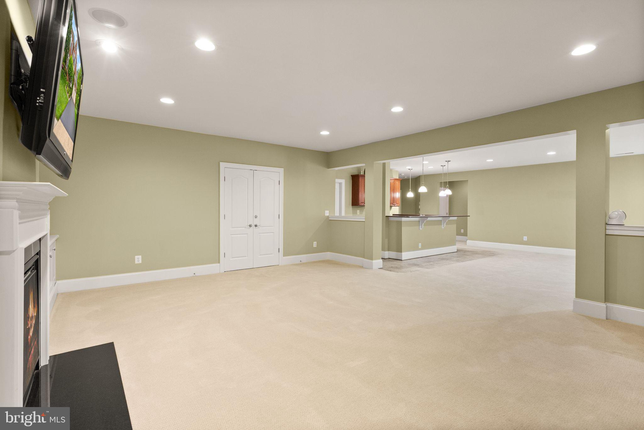 7534 Red Hill Drive Springfield, VA 22153 - Photo 68 of 90 a view of an empty room with a fireplace