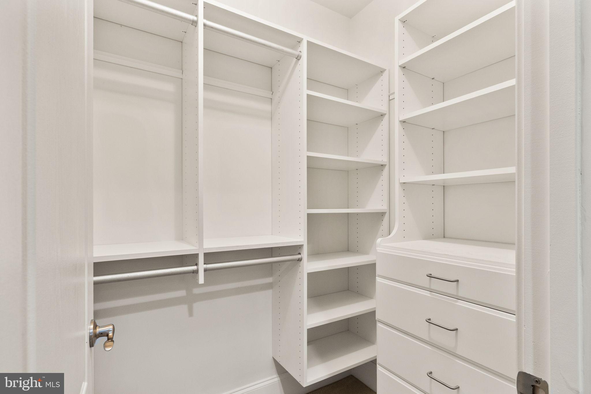 7534 Red Hill Drive Springfield, VA 22153 - Photo 72 of 90 a view of walk in closet with empty racks