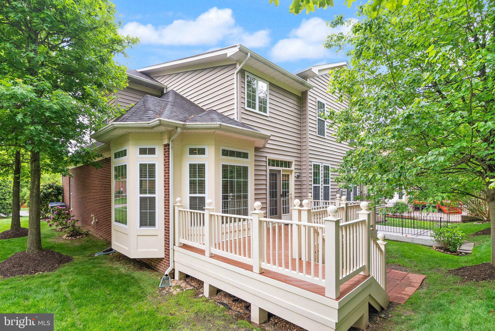 7534 Red Hill Drive Springfield, VA 22153 - Photo 82 of 90 a view of a house with a yard and deck