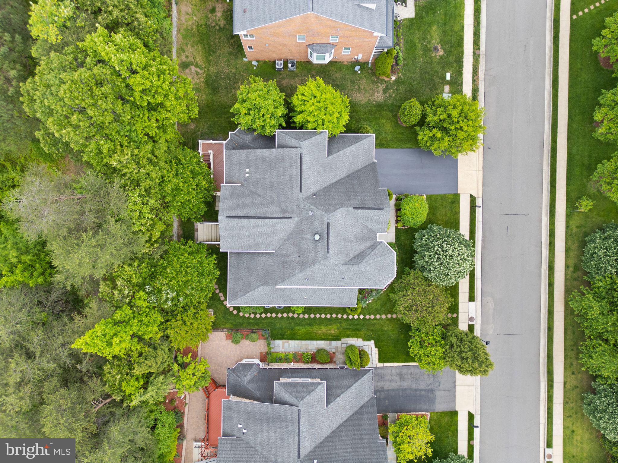 7534 Red Hill Drive Springfield, VA 22153 - Photo 87 of 90 an aerial view of a house with a garden and trees