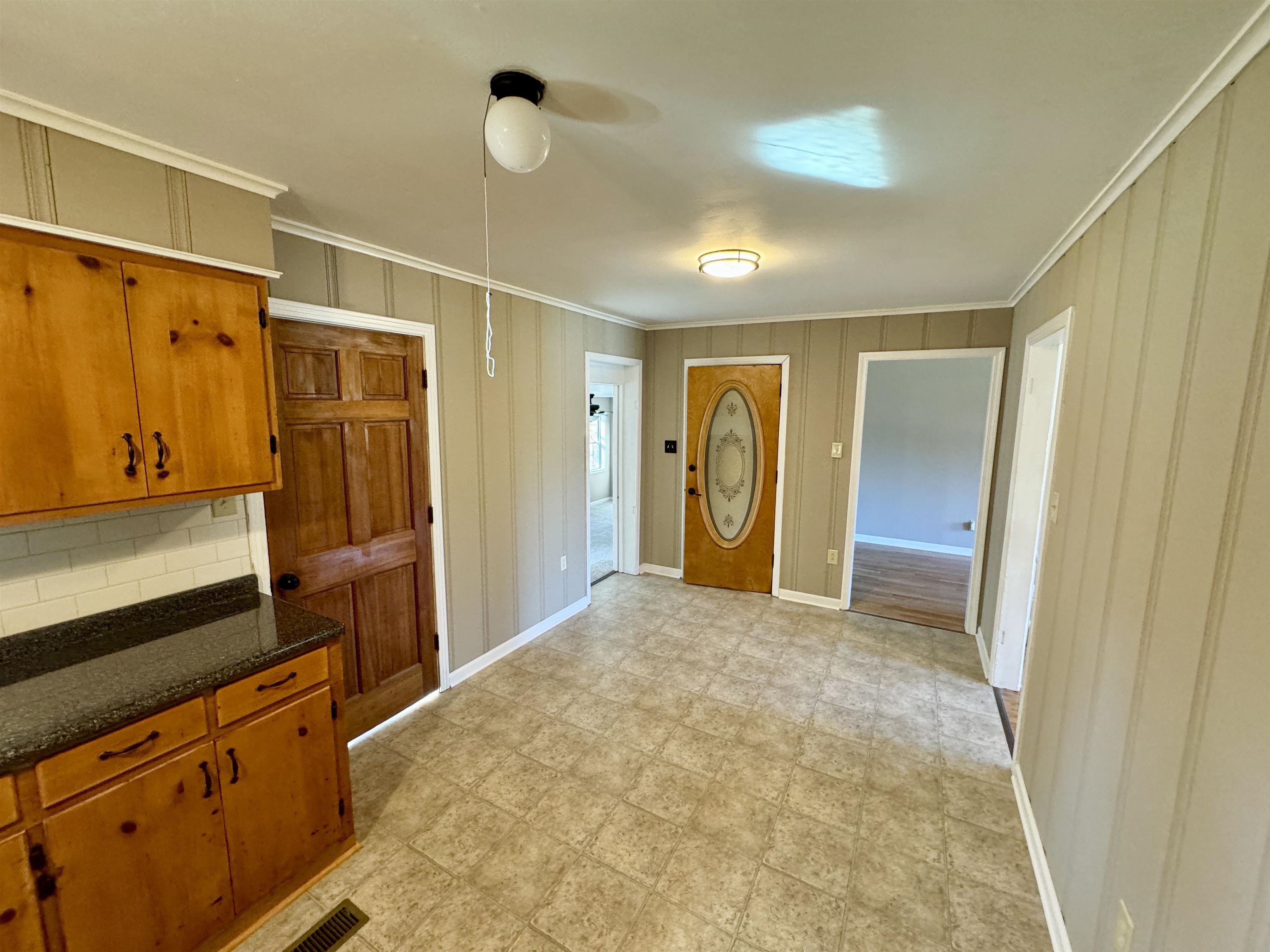 35 Ellis Loop Ripley, TN 38063 - Photo 12 of 18 a view of hallway with wooden floor and cabinet