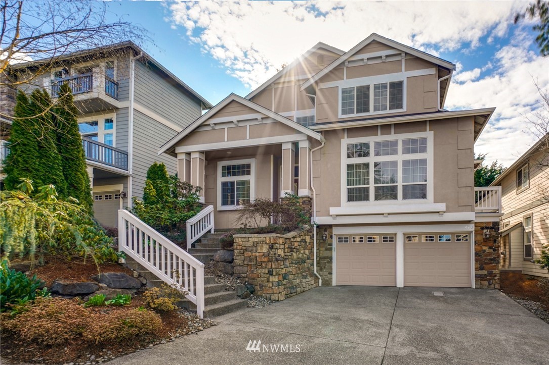 4113 Northeast 27th Place Renton, WA 98059 - Photo 2 of 27 a front view of a house with balcony