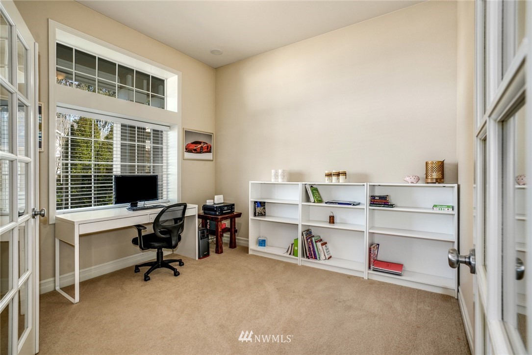 4113 Northeast 27th Place Renton, WA 98059 - Photo 4 of 27 a view of a workspace with furniture