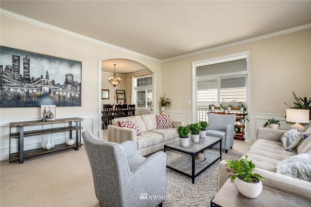 4113 Northeast 27th Place Renton, WA 98059 - Photo 6 of 27 a living room with furniture and a potted plant