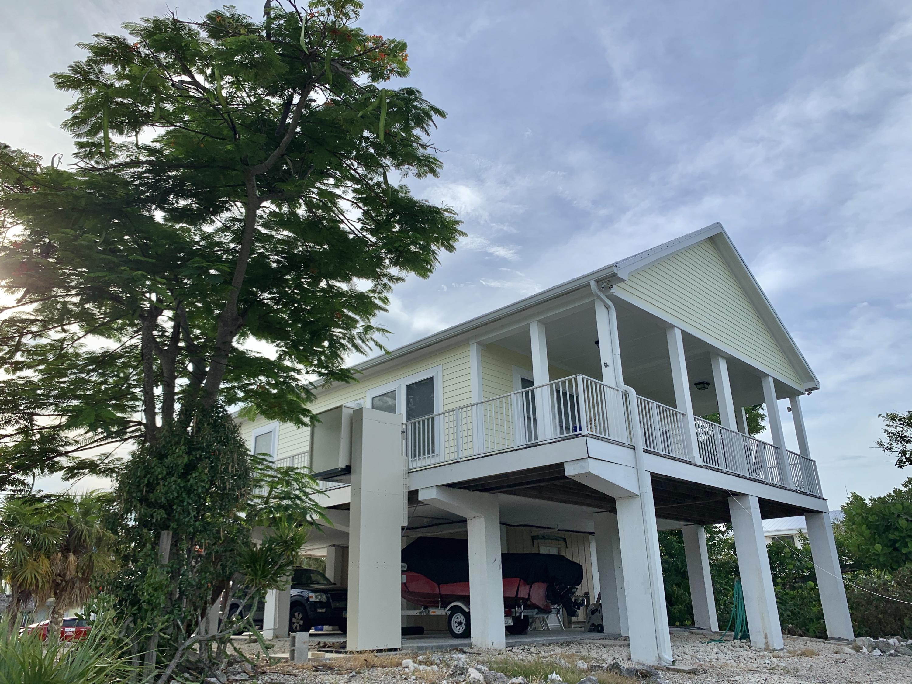 3853 Joyce Road Big Pine Key, FL 33043 - Photo 3 of 38 Back of House with elevator lift