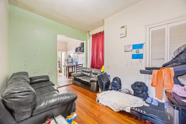 a living room with furniture and a couch