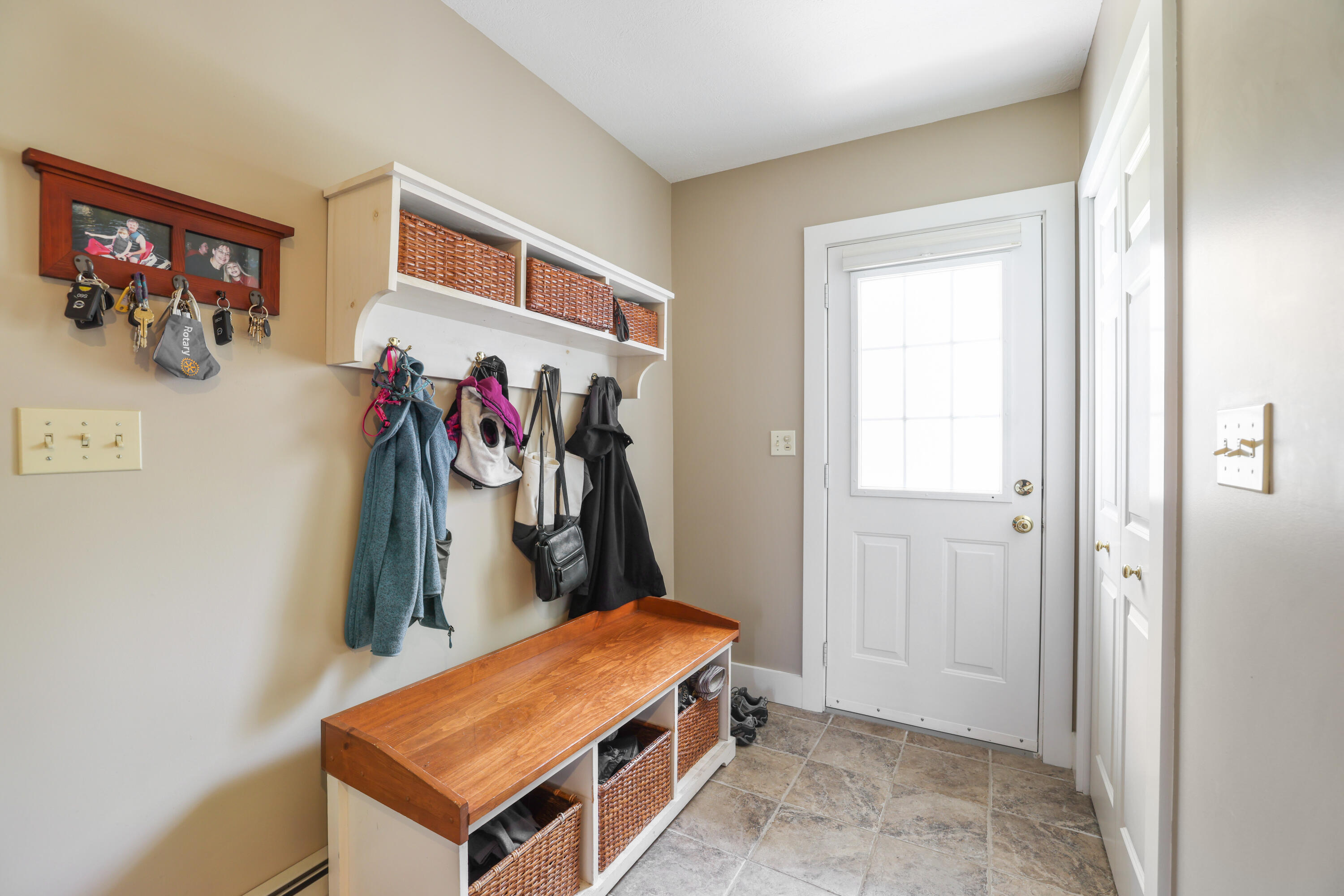125 Webber Hill Road Kennebunk, ME 04043 - Photo 2 of 38 Tiled Mudroom Entrance