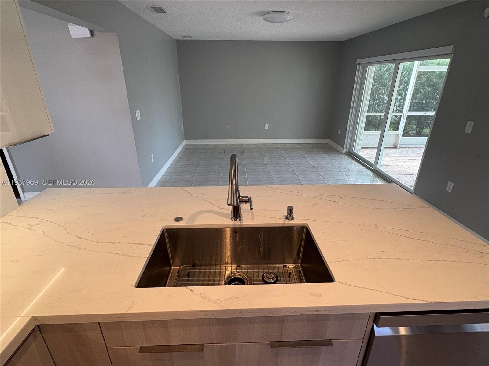 117 Danielle Court Weston, FL 33326 - Photo 12 of 43 a view of a kitchen sink and a window