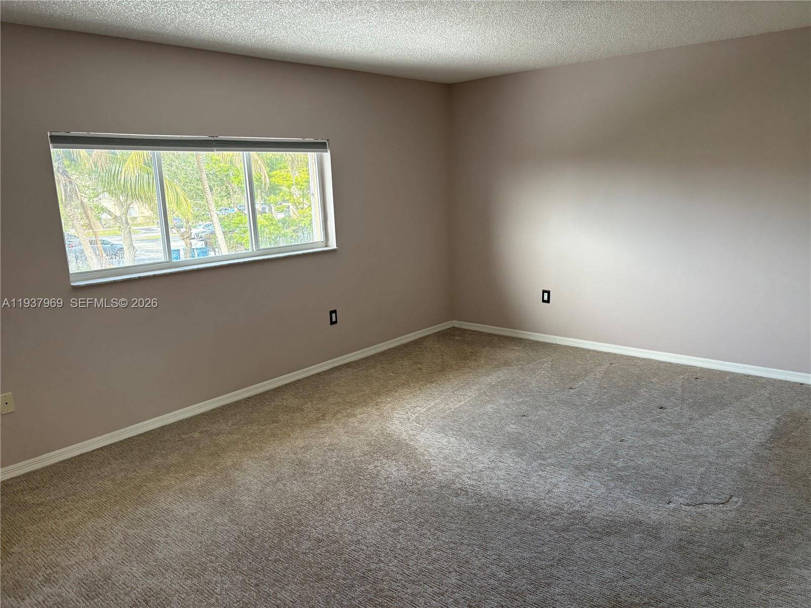 117 Danielle Court Weston, FL 33326 - Photo 14 of 43 an empty room with a window