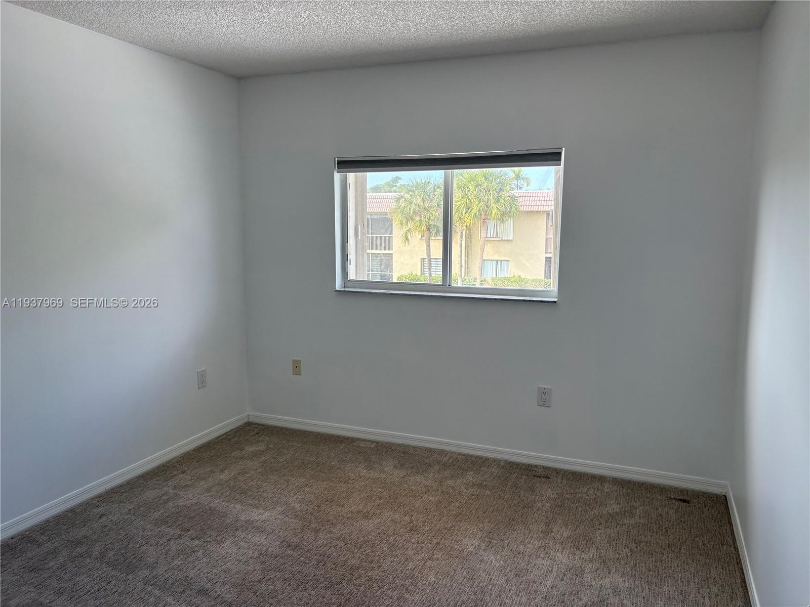 117 Danielle Court Weston, FL 33326 - Photo 18 of 43 an empty room with a window
