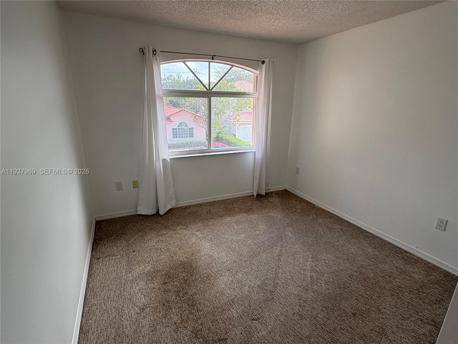 117 Danielle Court Weston, FL 33326 - Photo 20 of 43 an empty room with a window