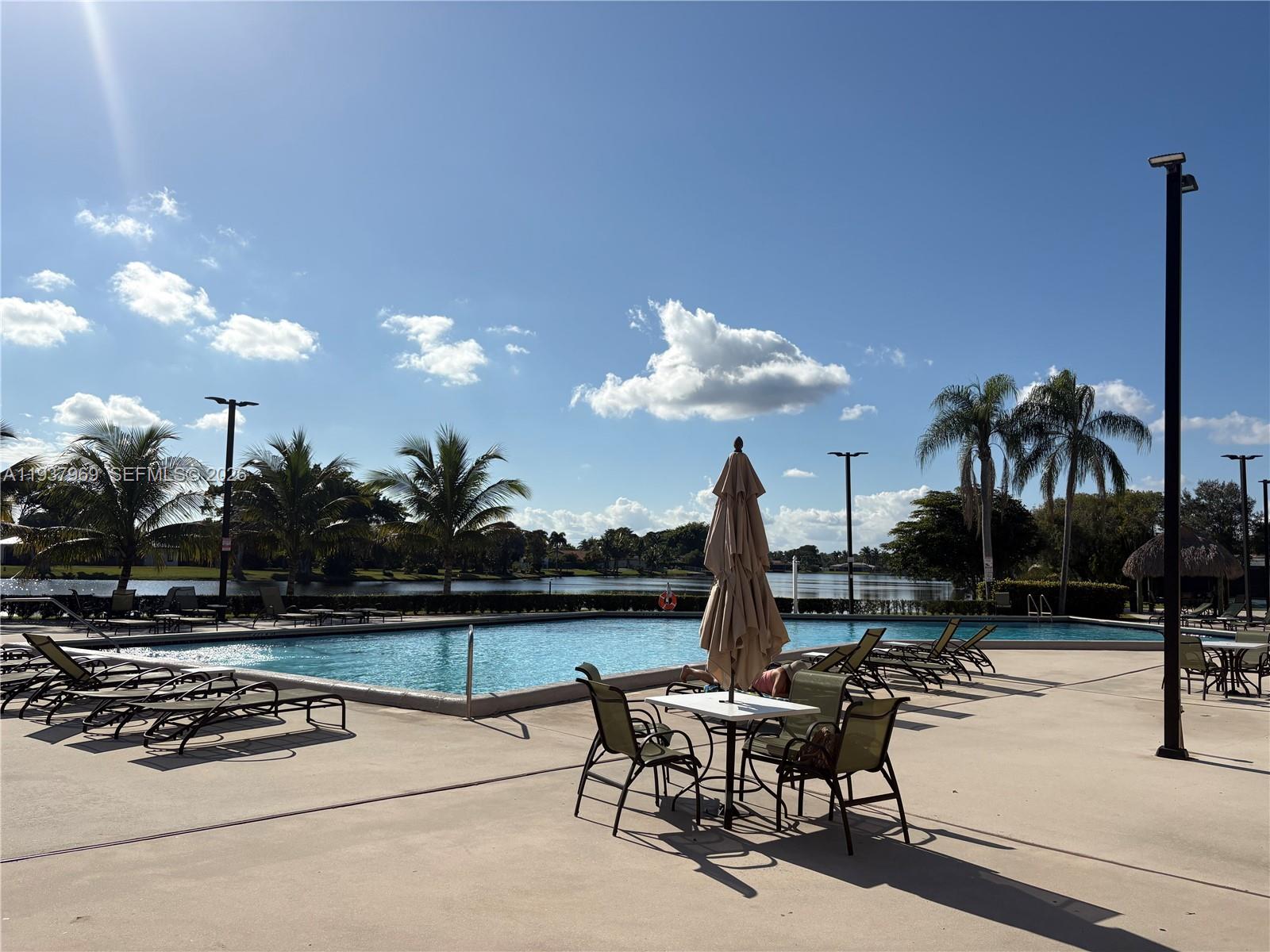 117 Danielle Court Weston, FL 33326 - Photo 37 of 43 a view of a terrace with furniture