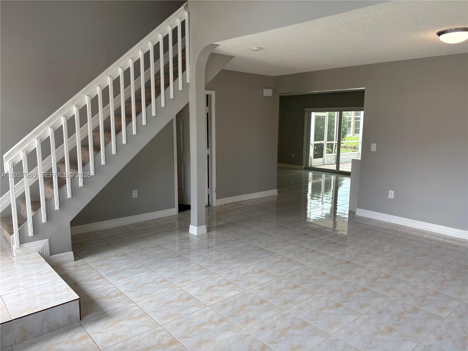 117 Danielle Court Weston, FL 33326 - Photo 4 of 43 a view of an entryway with staircase