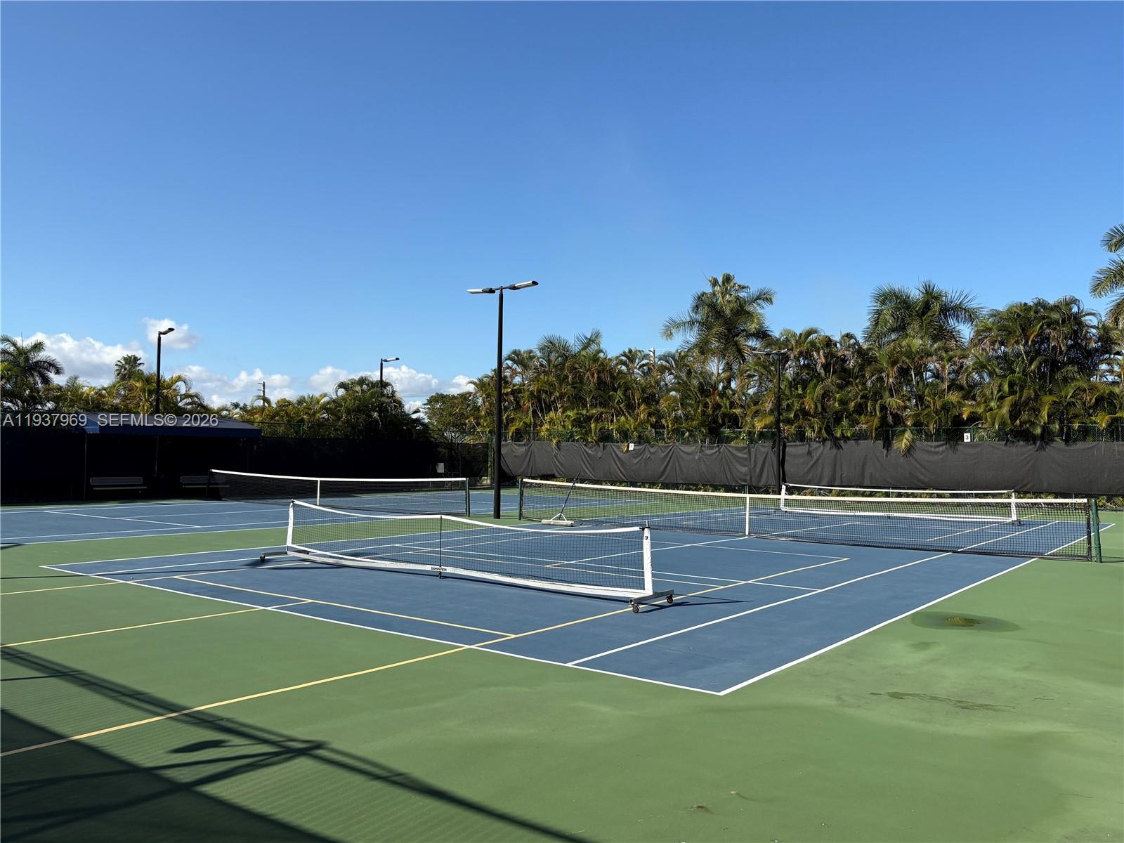 117 Danielle Court Weston, FL 33326 - Photo 42 of 43 a view of a tennis court