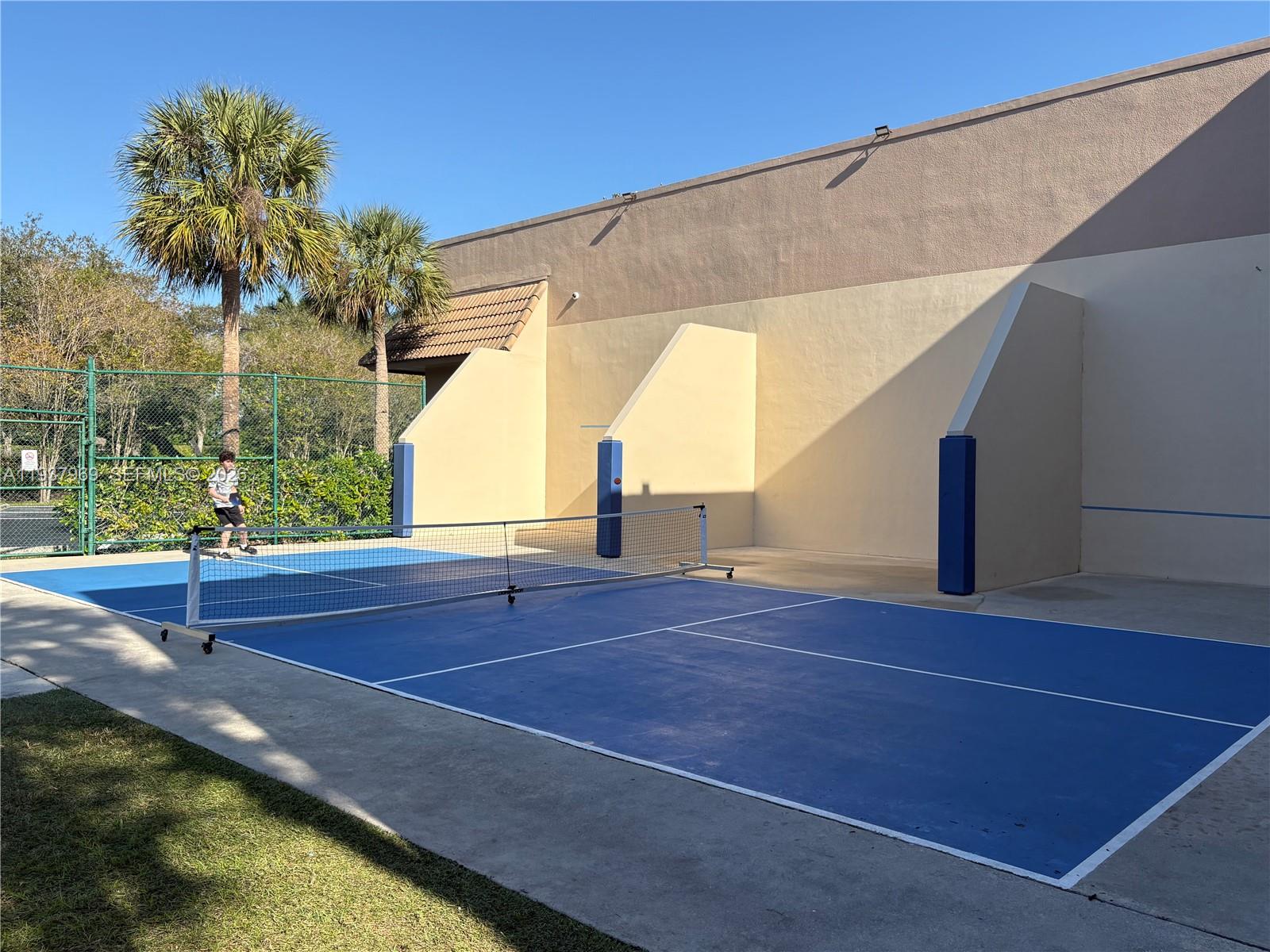 117 Danielle Court Weston, FL 33326 - Photo 43 of 43 a view of a tennis court