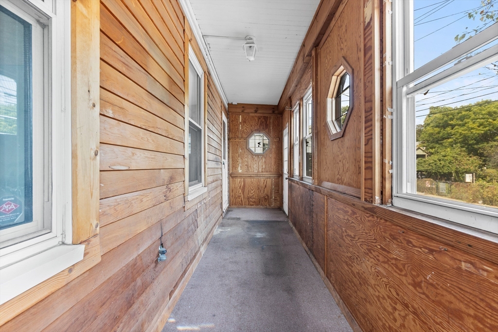 66 Round Hill Street Boston, MA 02130 - Photo 12 of 17 a view of a house with a door and porch
