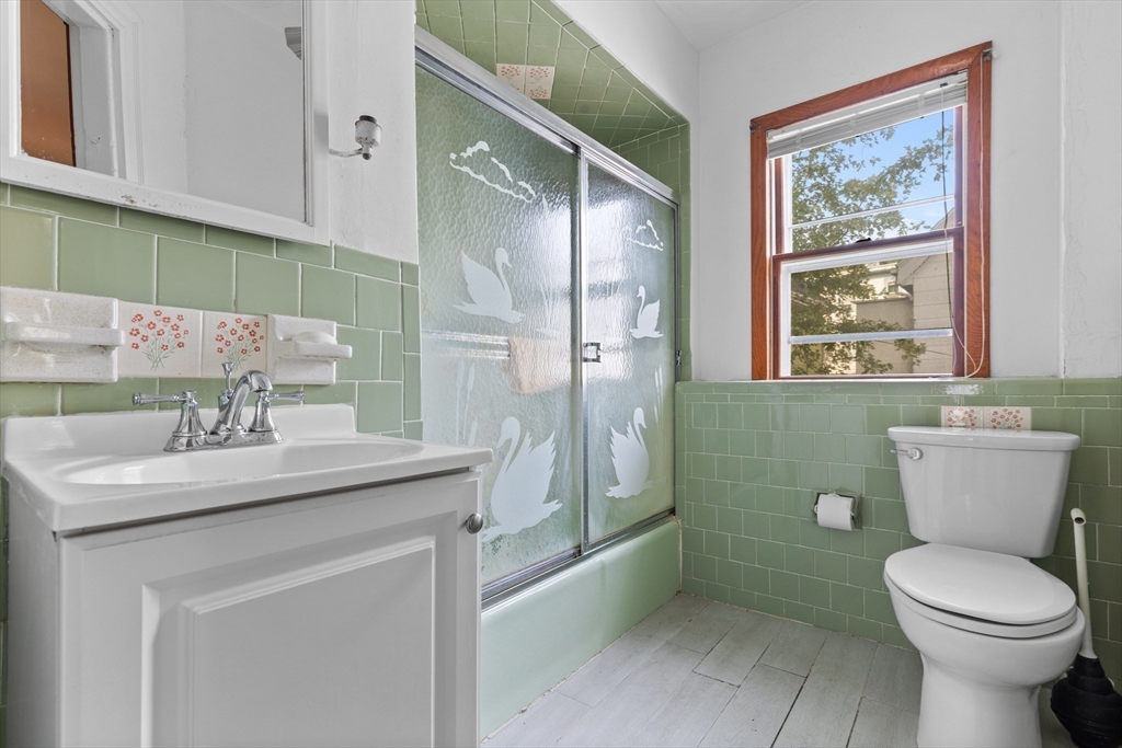 66 Round Hill Street Boston, MA 02130 - Photo 8 of 17 a bathroom with a sink toilet and shower