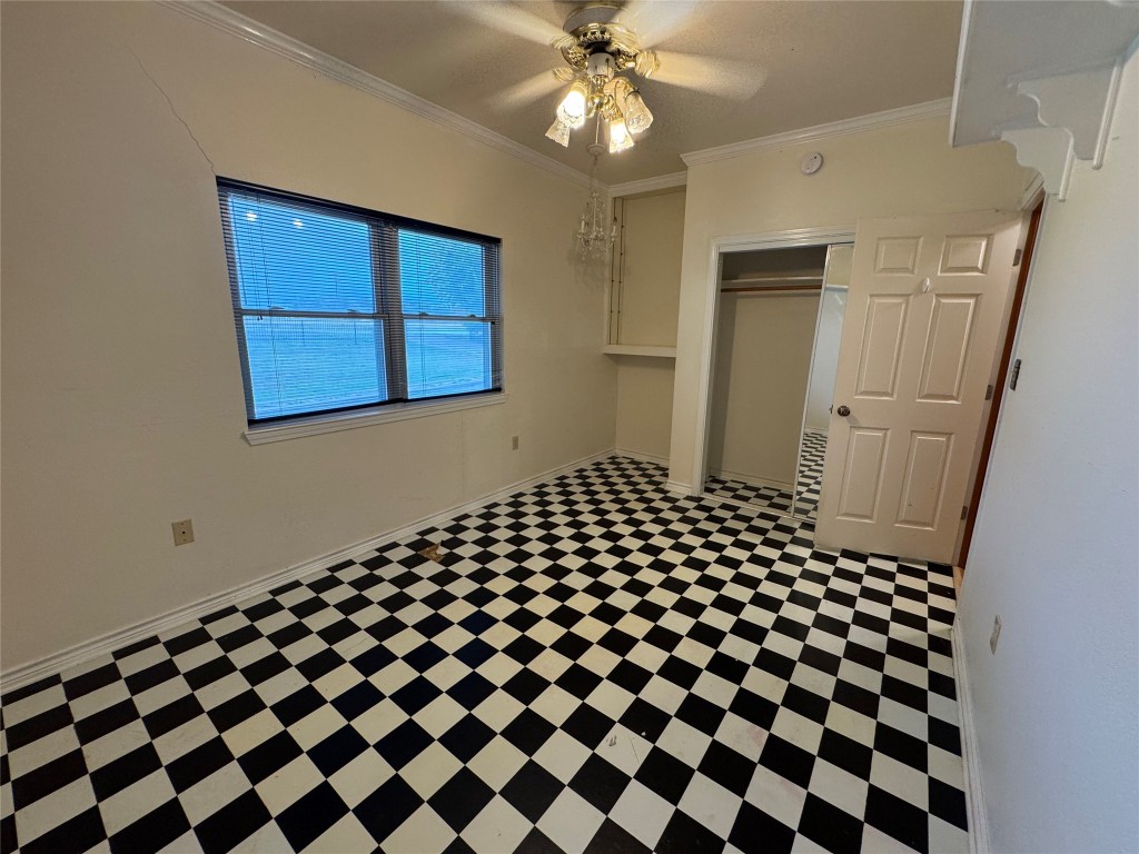 5054 Old Goforth Road Buda, TX 78610 - Photo 11 of 28 a black and white checkered floor