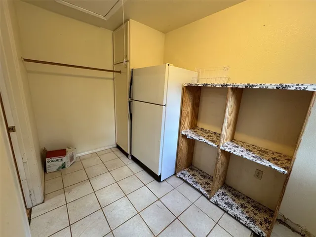 a view of a storage & utility room with washer and dryer