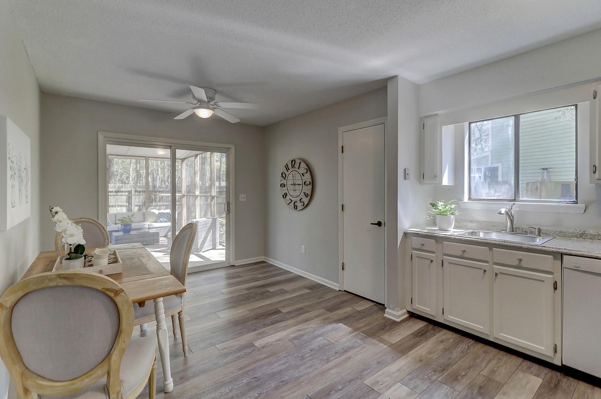1416 School House Road Mount Pleasant, SC 29464 - Photo 8 of 28 Kitchen with screened porch
