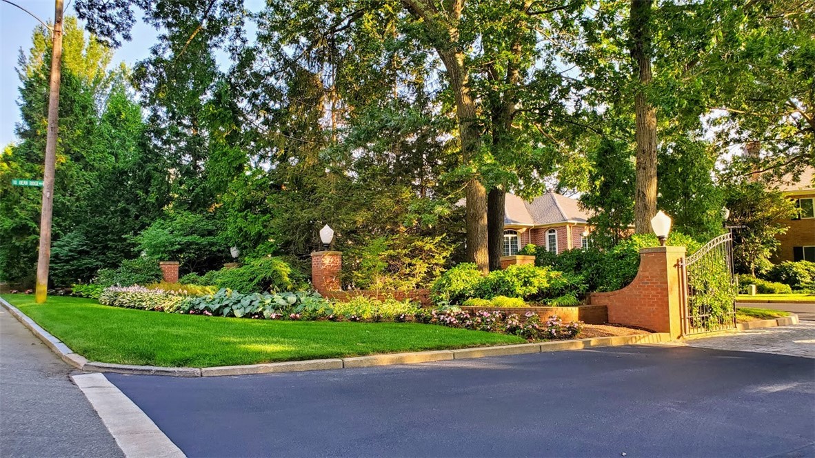 7 Oak Tree Lane Cranston, RI 02920 - Photo 31 of 32 Entrance to Dean Ridge. Lush landscaping greets you upon entering.