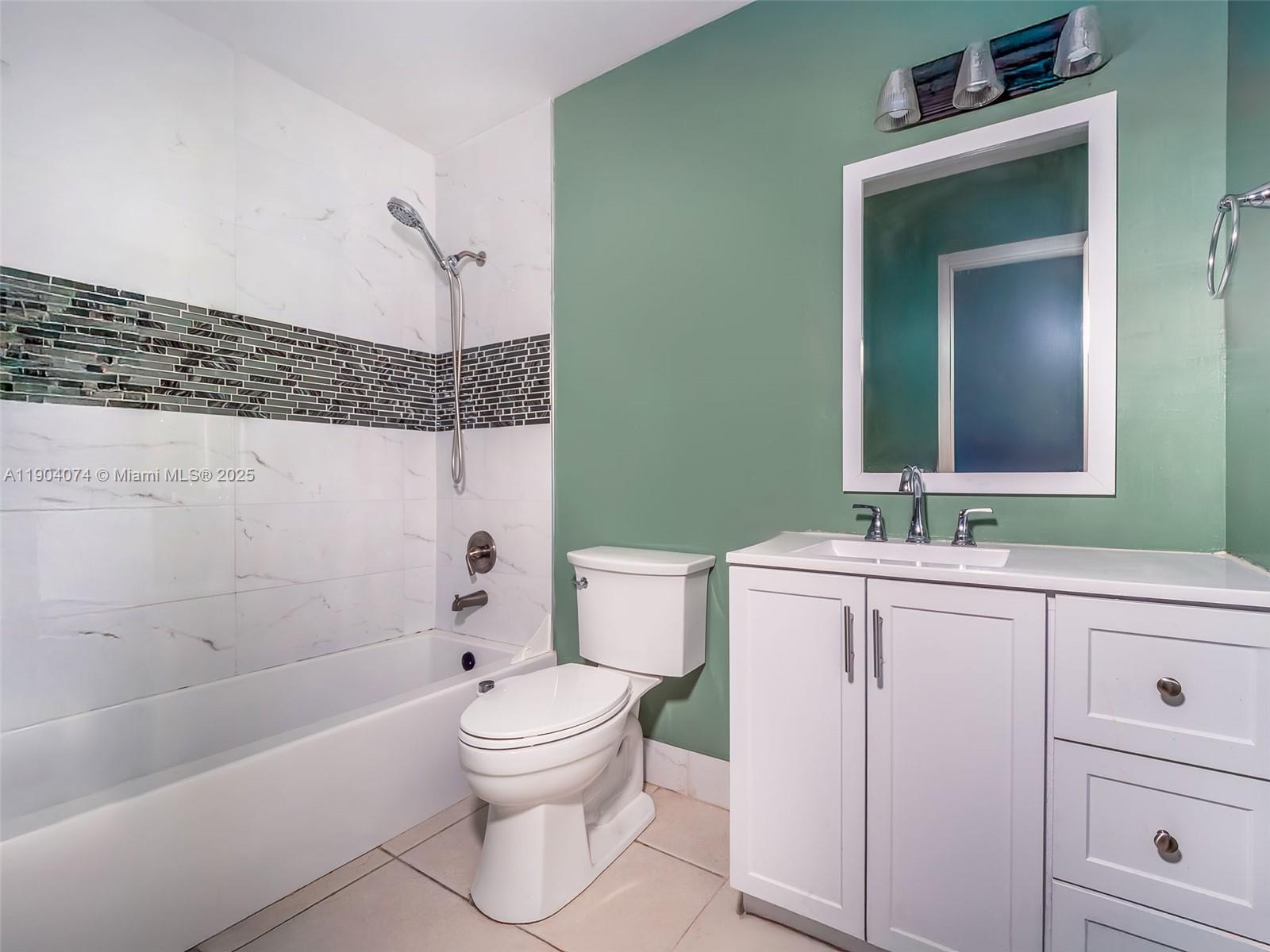 6510 Southwest 49th Street Davie, FL 33314 - Photo 12 of 26 a bathroom with a sink a toilet and shower