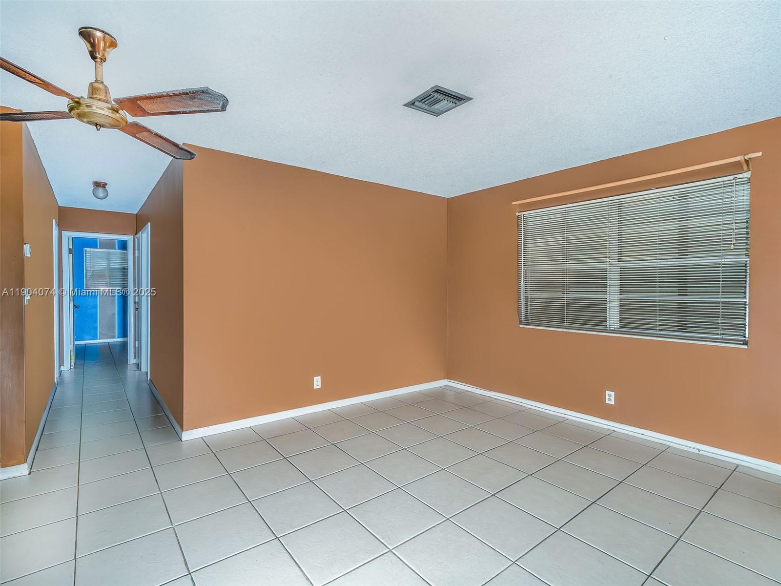 6510 Southwest 49th Street Davie, FL 33314 - Photo 14 of 26 a view of an empty room with a window