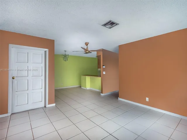 a view of a room with cabinets