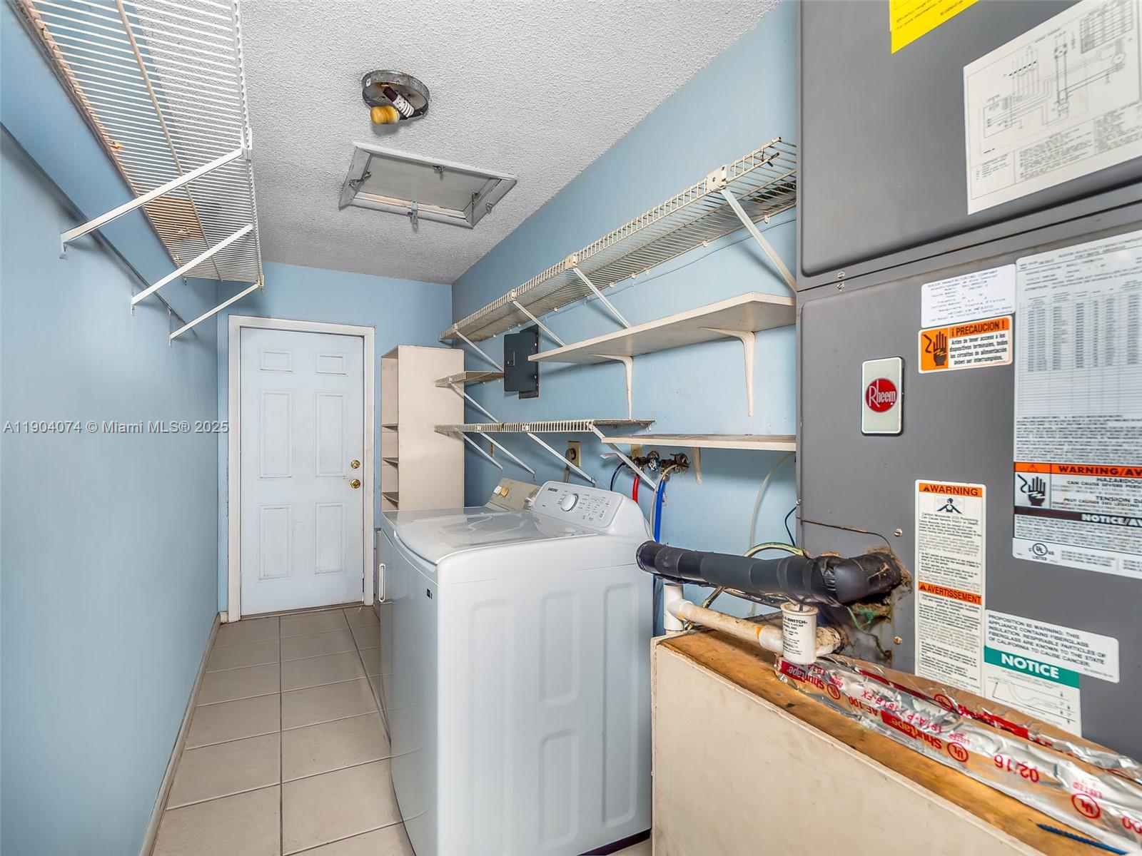 6510 Southwest 49th Street Davie, FL 33314 - Photo 19 of 26 a utility room with dryer and washer