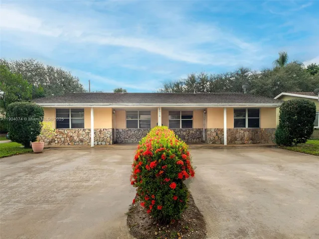front view of house with a yard